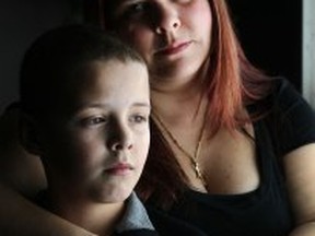 Jennifer Jensen, pictured with her son, Shane Jensen, 9, Saturday, Feb. 7, 2015, was diagnosed with cervical cancer in December of last year.  Her son Shane had a relapse of cancer in October of last year.  (DAX MELMER/The Windsor Star)