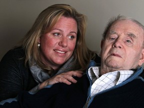 Kimberley Evans spends time with her grandfather,  Ronald Taylor, 90 at Seasons Amherstburg on February 11, 2015 in Amherstburg, Ontario. (JASON KRYK/The Windsor Star)