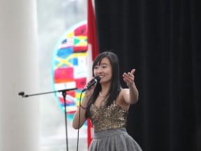 University of Windsor student Yutong Liu sings a traditional Chinese song during the  Celebration of Nations event takes place at the University of Windsor C.A.W. Centre in Windsor, Ontario on February 26, 2015.  (JASON KRYK/The Windsor Star)