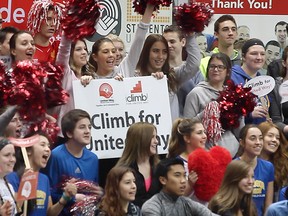 Over 2,000 climbers participated in the 6th annual iClimb for United Way event held at the WFCU Centre on Wednesday, Feb. 25, 2015, in Windsor, Ont. Students from local elementary and secondary schools, 20 workplaces and 150 volunteers took part in the event that raises money for mental health programs. A group of local students pose for a photo during the event. (DAN JANISSE/ The Windsor Star)