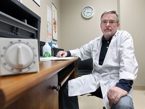 Dr. David Bridgeo is shown Monday, Feb. 16, 2015, at his downtown Windsor, ON. office. He is among several doctors who plan on taking work action in March against OHIP billing rules. (DAN JANISSE/The Windsor Star)