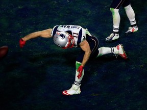 GLENDALE, AZ - FEBRUARY 01:  Julian Edelman #11 of the New England Patriots celebrates as he scores a 3 yard touchdown in the fourth quarter against Seattle Seahawks during Super Bowl XLIX at University of Phoenix Stadium on February 1, 2015 in Glendale, Arizona.  (Photo by Jamie Squire/Getty Images)