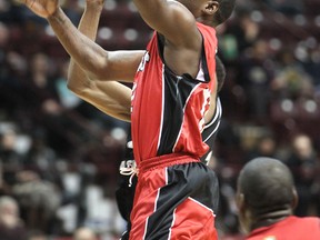 Windsor's Tony Bennett slices to the basket for two points as the Windsor Express host the Mississauga Power at the WFCU Centre, Sunday, Feb. 22, 2015.  (DAX MELMER/The Windsor Star)