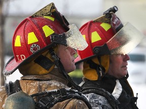 Windsor firefighters battle a house fire on Wednesday, Feb. 18, 2015, in the 700 block of Windsor Avenue.  (DAN JANISSE/The Windsor Star)