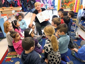 St. Anne's French Immersion School teacher Carole Dray teaches a first grade class on Wednesday, Feb. 25, 2015, in Windsor, Ont. (DAN JANISSE/The Windsor Star)