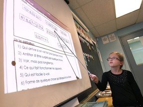St. Anne's French Immersion School student Brooklyn Bechard participates in a lesson on Wednesday, Feb. 25, 2015, in Windsor, Ont.