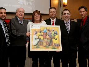 WINDSOR, ONT.: (2/14/15) -- Mark Morin, left, Gord Gray, Charie Virga, Mike Virga, Bruce Moncur and Bob Bellacicco attend Hearts Together for Haiti, Saturday, Feb. 14, 2015, at the Fogolar Furlan. Proceeds of the annual charity gala go towards improving the quality of life in Haiti. (RICK DAWES/The Windsor Star)