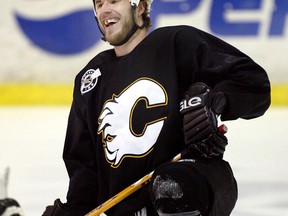 Calgary Flames' defenceman Steve Montador laughs as he stretches during practice in San Jose, Calif., Monday, May 10, 2004. Former NHL defenceman Montador has died at the age of 35. THE CANADIAN PRESS//Ryan Remiorz