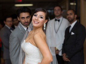 In some behind-the-scenes fun at the Wedding Odyssey fashion show at the Ciociaro Club last month, a model poses for the camera while groomsmen photobomb the shot. She’s wearing a gown from Here Comes the Bride, they’re in tuxes from Tip Top Tailors. Odyssey Event Productions, which put on the Jan. 10-11 event, is organizing the Bridal and Event Expo Apr. 29-30 at the Ciociaro Club.
Photo courtesy of Misha Z Photography