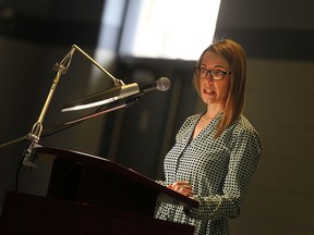 Lyndsay Rosenthal, a second year PHD candidate at Wilfrid Laurier University, gives a presentation entitled "Living with war: Shell shock victims of World War I" at the 10th Windsor Military Studies Conference at the Major F. A. Tilston VC Armoury, Saturday, Feb. 7, 2015.  (DAX MELMER/The Windsor Star)