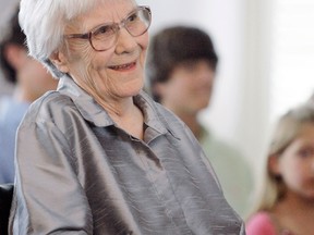 FILE - In this Aug. 20, 2007 file photo, Author Harper Lee smiles during a ceremony honoring the four new members of the Alabama Academy of Honor, Monday, Aug. 20, 2007, in at the state Capitol in Montgomery, Ala. (AP Photo/Rob Carr, File)