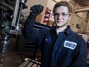 Jake Filiault, 18, a grade 12 Belle River High School student, is pictured at Reko Manufacturing Group where he participates in the Ontario Youth Apprentice Program (OYAP), Monday, Feb. 2, 2014.  (DAX MELMER/The Windsor Star)