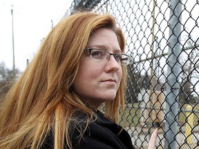 Tracey Ramsey, 2015 NDP candidate for the federal riding of Essex, stands outside the closed Ford plant in Windsor in this 2012 file photo. (Tyler Brownbridge / The Windsor Star)