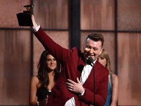 Sam Smith accepts the award for best new artist at the 57th annual Grammy Awards on Sunday, Feb. 8, 2015, in Los Angeles. (Photo by John Shearer/Invision/AP)