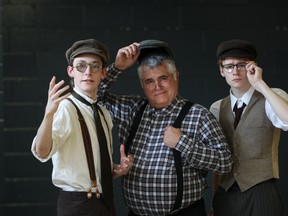 WINDSOR, ONTARIO - February 3, 2015 - From Left, Jeremy Burke as Orville Wright,  Peter Hrastovec as John T. Daniels, and Tim Maitland as Wilbur Wright. Windsor Symphony Orchestra, as conducted by Music Director Robert Franz, will perform a piece by American composer Lawrence Dillon titled Wright Flight, Saturday, Feb. 7 at 8 p.m. at Capitol Theatre, 121 University Ave. W. The composition tells the story of Orville and Wilbur Wright’s historic flight through music. (JASON KRYK/The Windsor Star)