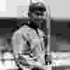 Detroit Tigers’ Ty Cobb posing in his uniform and holding a bat in 1915. (Howard Muller/Hulton Archive/Getty Images)