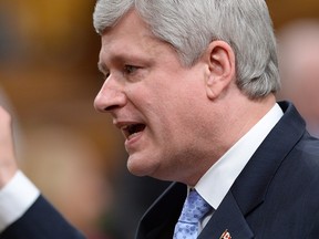In this file photo, Prime Minister Stephen Harper responds to a question during question period in the House of Commons on Parliament Hill in Ottawa on Wednesday, January 28, 2015. THE CANADIAN PRESS/Sean Kilpatrick
