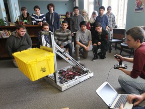 The Kennedy Cache Robotics Team test a robot during preparation for a Robotics Competition on Easter Weekend, on March 23, 2015. (JASON KRYK/The Windsor Star)