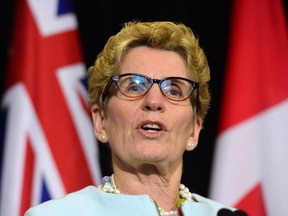 While local school boards talk of budget cuts, Premier Kathleen Wynne was boasting at Queen’s Park about her government increasing funding. (FRANK GUNN/The Canadian Press)