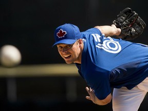 Toronto Blue Jays pitcher Andrew Albers gave up three singles in two-thirds of an inning in an outing Sunday against Pittsburgh but escaped without a run thanks to a helping hand from pitcher Bo Schultz. (THE CANADIAN PRESS/Nathan Denette)