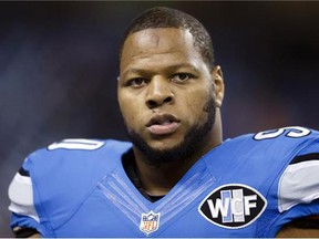 Ndamukong Suh was a three-time first-team All-Pro defensive tackle with the Detroit Lions. (AP Photo/Rick Osentoski, File)