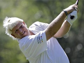 John Daly hits his tee shot on the ninth hole during the pro-am round for the Valspar Championship at Innisbrook Wednesday, March 11, 2015, in Palm Harbor, Fla. (AP Photo/Chris O'Meara)