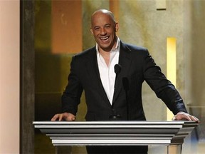 Vin Diesel speaks on stage at the 45th NAACP Image Awards at the Pasadena Civic Auditorium in Pasadena, Calif. Vin Diesel, who announced Monday, March 23, 2015, on the Today Show that he named his newborn daughter Pauline in honor of his late friend and longtime co-star Paul Walker, revealed that some old advice from Walker had been top of mind in the moment. Vin Diesel, and Walker, co-starred in the “Fast & Furious" franchise. (Chris Pizzello/Invision/AP, File)