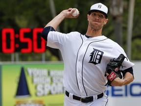 Detroit Tigers pitcher Shane Greene warms up before an exhibition game against the Houston Astros in Lakeland, Fla. (AP Photo/Gene J. Puskar)