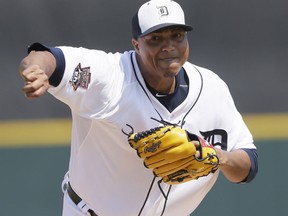 Detroit's Alfredo Simon throws a warmup pitch before the first inning of the exhibition game against the New York Yankees Friday in Lakeland, Fla. (AP Photo/Carlos Osorio)