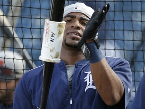 Detroit's Yoenis Cespedes checks his bat during batting practice before an exhibition game against the New York Yankees Tuesday in Tampa, Fla. (AP Photo/Kathy Willens)