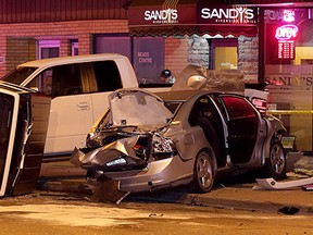 Windsor Police are investigating a six-vehicle pileup on Wyandotte Street East near St. Rose Avenue where an eastbound Jeep lost control and collided with a Volvo, Ford F-150 truck, Ford Fusion, Jeep Liberty and Chrysler Sebring parked on the south curb, March 31, 2015. (NICK BRANCACCIO/The Windsor Star)