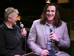 LaSalle's Luke Willson, right, talks with Mary Caton at the Windsor Star News Cafe Monday. (TYLER BROWNBRIDGE/The Windsor Star)