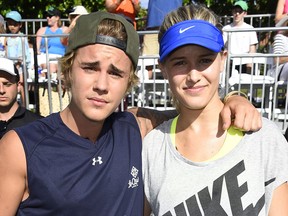Justin Bieber and tennis player Eugenie "Genie" Bouchard attend the 11th Annual Desert Smash Hosted By Will Ferrell Benefiting Cancer For College at La Quinta Resort and Club on March 10, 2015 in La Quinta, California.  (Photo by Frazer Harrison/Getty Images for Desert Smash)