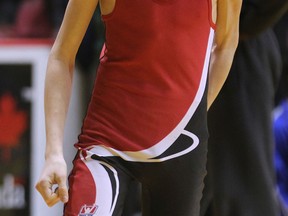 Jarod Burchill of Lord Dorchester School celebrates victory during OFSAA wrestling championship at the WFCU Centre in Windsor, ON. on Tuesday, March 3, 2015. (DAN JANISSE/ The Windsor Star)