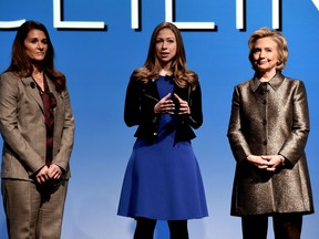 (L-R) Melinda Gates, Chelsea Clinton and Hillary Clinton participate in a women's equality event March 9, 2015 in New York. Two women with global clout -- Hillary Clinton and Melinda Gates -- released a sweeping report on Monday showing that women are still far from winning equality in leadership positions. The "No Ceilings Full Participation" report is a review of progress made by women since the 1995 Beijing conference laid out a platform of action for achieving gender equality. The report was released at the start of a 12-day UN conference on women that will focus on women's political power and their influence in economic decision-making. The report was compiled by the Clinton and Gates foundations, the Economist Intelligence Unit and the World Policy Center of the University of California in Los Angeles. AFP PHOTO/Don EmmertDON EMMERT/AFP/Getty Images