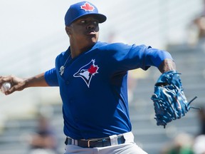 Toronto's Marcus Stroman throws a pitch against the Pittsburgh Pirates during the first inning of Grapefruit League baseball action Wednesday in Bradenton, Fla. (THE CANADIAN PRESS/Nathan Denette)