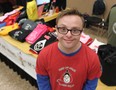 Andrew Banar, owner of Group Hug Apparel, was named a Canadian Down Syndrome Hero by the Canadian Down Syndrome Society.  Since starting his business, he's raised around $35,000 for charities. (JASON KRYK/The Windsor Star)
