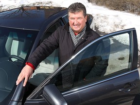 Art Lesny, a retired Toyota salesman, is shown with his vehicle on March 5, 2015. (DAN JANISSE/ The Windsor Star)