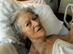 In this file photo, Lucette Chiasson-Plourde, 80, rests in her bed at Windsor Regional Hospital Ouellette Campus in Windsor on Friday, February 27, 2015. Chiasson-Plourde was struck by a Transit Windsor bus.  (TYLER BROWNBRIDGE/The Windsor Star)