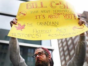 Windsorites gathered downtown to rally against the government's proposed anti-terrorism bill on Friday, March 14, 2015. (DAX MELMER/The Windsor Star)