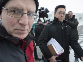 Benjamin Levin a former Ontario deputy minister of education and a former professor at the University of Toronto leaves a Toronto court on Tuesday March 3 2015, after pleading guilty to three charges relating to child pornography. THE CANADIAN PRESS/Chris Young