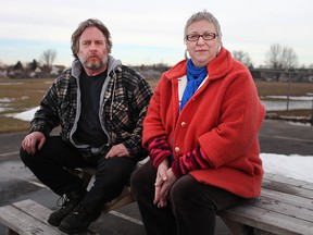 Marlene Westfall, 50, and Jeff Kerr, 58, left, are pictured at Remington Park, Friday, March 13, 2015, after a report from the local Health Unit identified a possible cancer cluster in the Remington Park neighbourhood.  Both Westfall and Kerr have had high incidences of cancer in their families. Westfall is currently in remission from breast cancer.  (DAX MELMER/The Windsor Star)