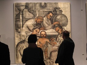 Visitors view a new exhibition titled "Diego Rivera and Frida Kahlo in Detroit" at the Detroit Institute of Arts in Detroit, MI, Tuesday, March 10, 2015. The exhibition focuses on the period between April 1932 and March 1933.  (DAN JANISSE/ The Windsor Star)