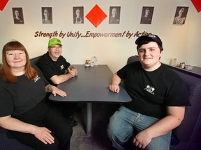 From left, June Bisetto, waitress, Ron Dunn, cook and co-manager, and Yaroslav Kior, waiter, are pictured at 10 Friends Diner, Monday, March 2, 2015.  (DAX MELMER/The Windsor Star)