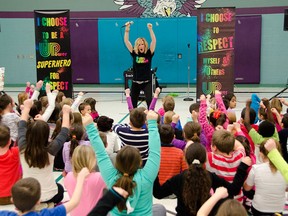 Sara Westbrook, motivational speaker and creator of UPower, presents her interactive program to a group of JK-Grade 3s at Our Lady of Perpetual Help Catholic Elementary School, Monday morning. Westbrook has designed numerous versions of her motivational program for different age groups, but respect and resilience is the fundamental message she aims to get across in every presentation. (GABRIELLE SMITH/Special to the Windsor Star)