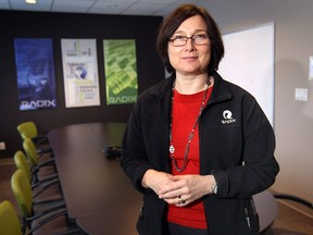 Shelley Fellows, vice-president at Radix Inc. in Tecumseh, Ont. is shown at her workplace on Wednesday, March 4, 2015. She is chair of the Windsor Essex Economic Development Agency board, and past president for the Workforce Windsor Essex board. She says women need to push past barriers to take on leadership roles. (DAN JANISSE/ The Windsor Star)