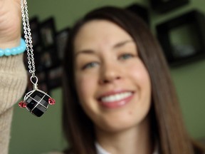 Courtney Fitzpatrick is photographed at her home in Windsor on Wednesday, March 4, 2015. Fitzpatrick, who has endometriosis, has created jewelry in the shape of a uterus.       (TYLER BROWNBRIDGE/The Windsor Star)