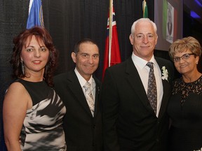 From left to right, 2008 Italian of the Year Niva Segatto, Caboto Pres. Dennis Segatto, 2014 Italian of the Year Frank Moceri and Kathryn Moceri celebrate Frank's recognition Saturday, March 7, 2015, at the Giovanni Caboto Club. The award honours community contributions of Italian immigrants and first generation Canadians. (RICK DAWES/Windsor Star)