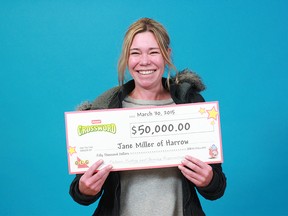 Jane Miller of Harrow shows the $50,000 cheque she won from playing an Instant Crossword scratch game. (Handout / The Windsor Star)