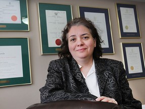 Immigration lawyer Maria Fernandes is shown in her Windsor, ON. office on Tuesday, March 24, 2015. For story on temporary foreign workers. (DAN JANISSE/The Windsor Star)